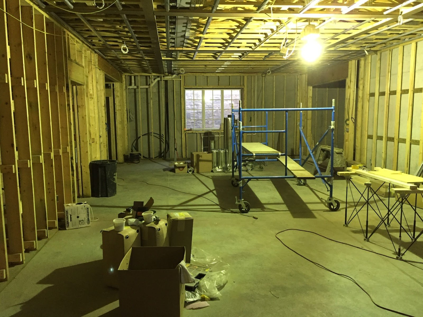 Basement build-out with new framing and mechanicals by Anderson Little Construction